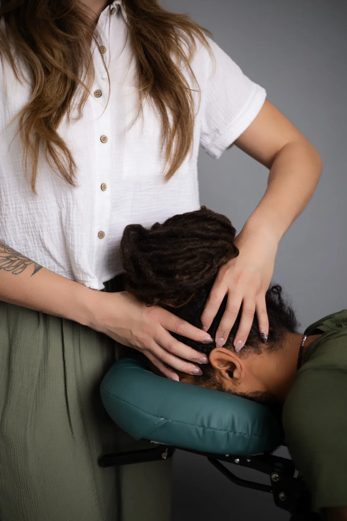 Scalp and neck work during a seated chair massage