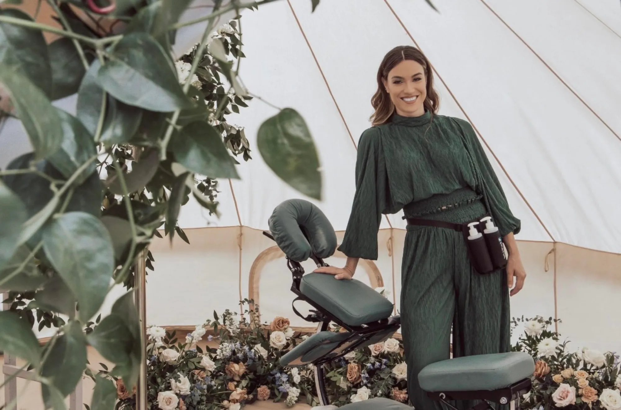 Skylar with her massage chair set up at a private event